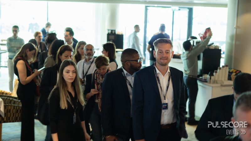Delegates networking in the venue foyer at a previous PulseCore event